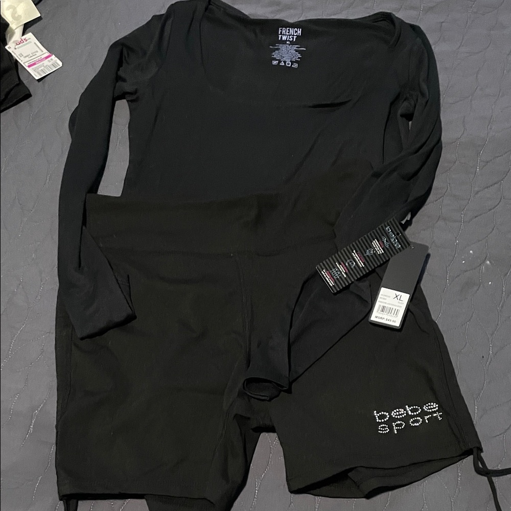 bebe Black Athletic Shorts and long sleeve silky dri weave ..extra long sleeves.
